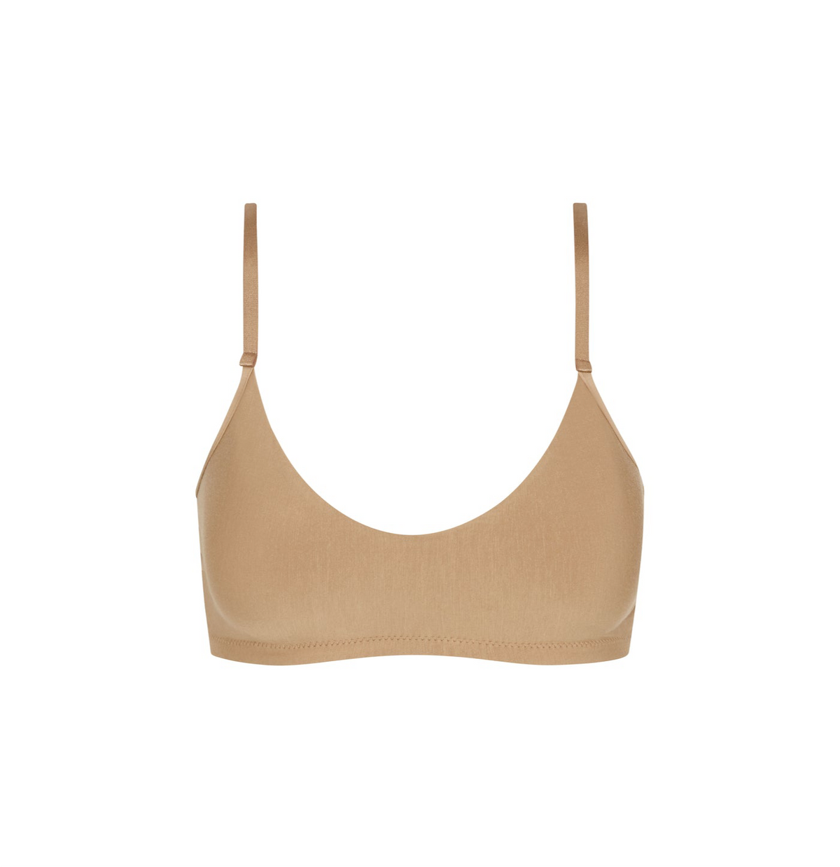 Beige bralette with thin straps on a white background