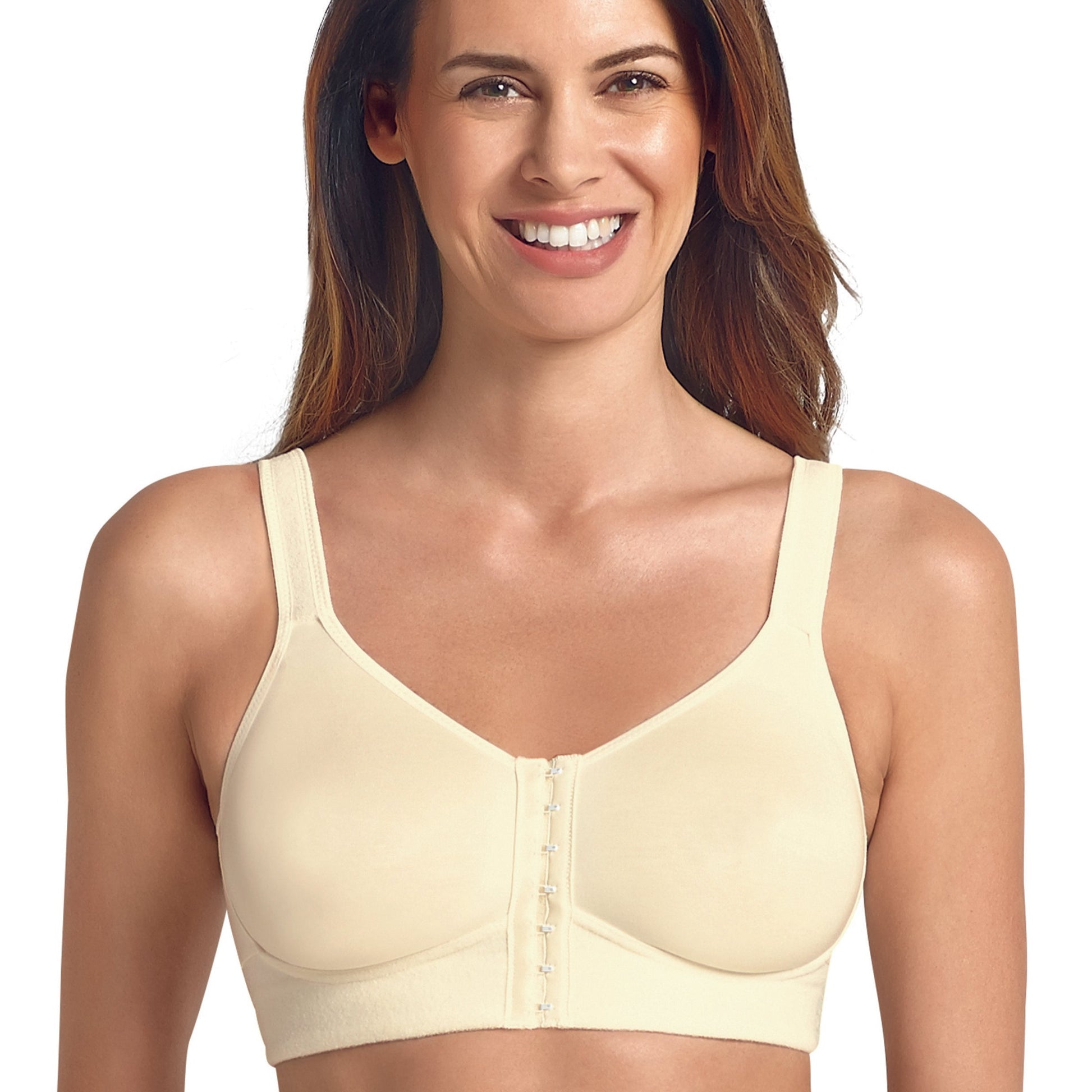 A woman is wearing a beige post-surgical wire-free bra with front closure.
