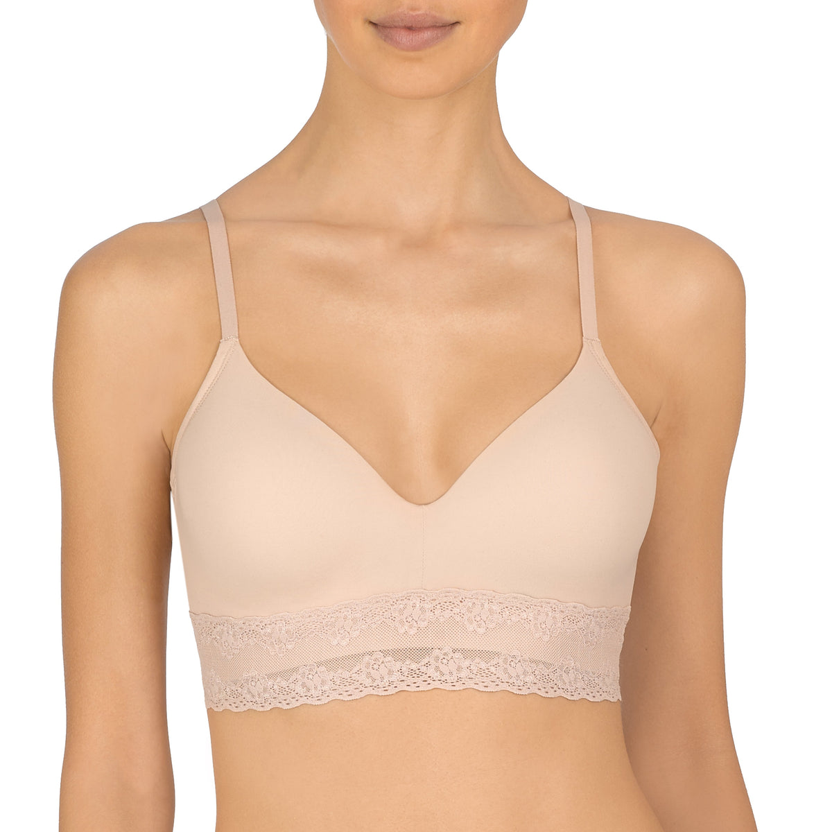 Beige bra with lace trim worn by a model on a white background
