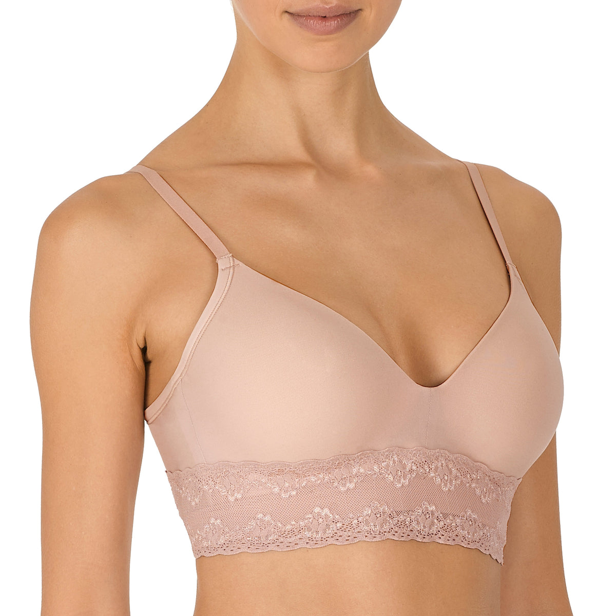 A wireless bra in rose beige color with stretch foam cups and soft lace trim.