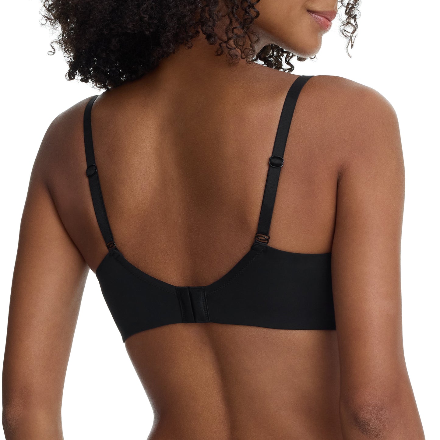 Black bra worn by a model on a white background
