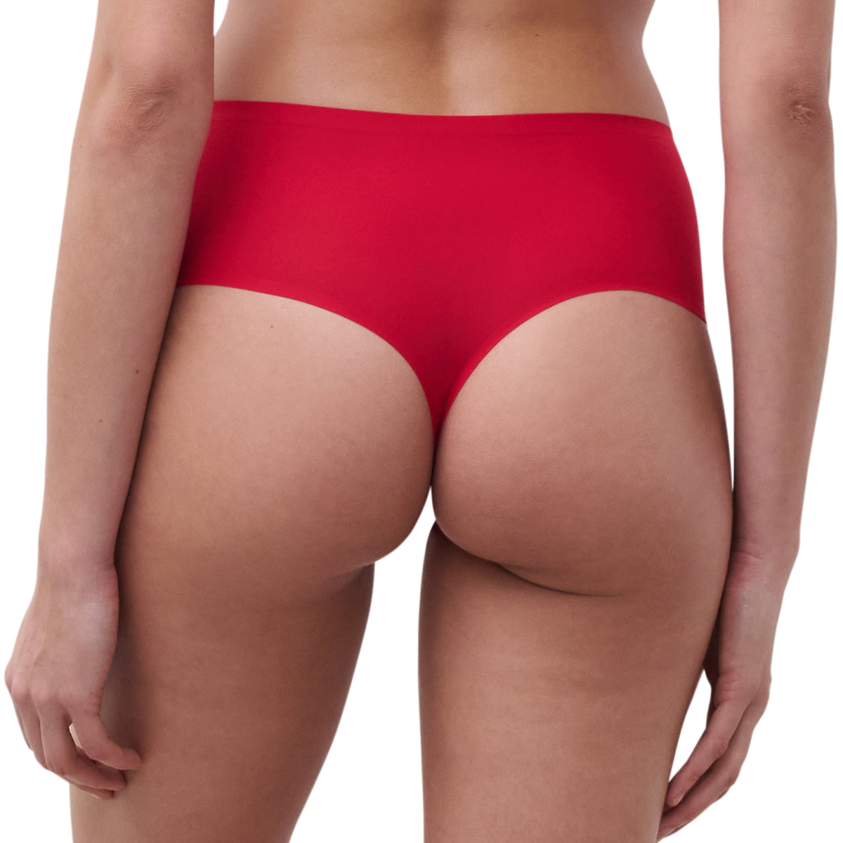 Red underwear worn by a person on a white background