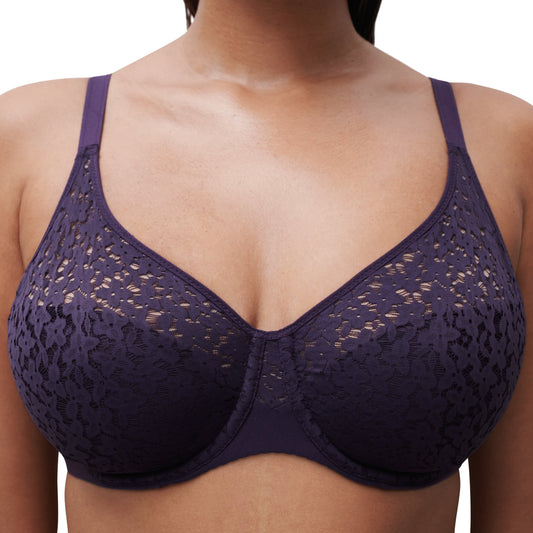 Navy blue lace bra on a model against a white background