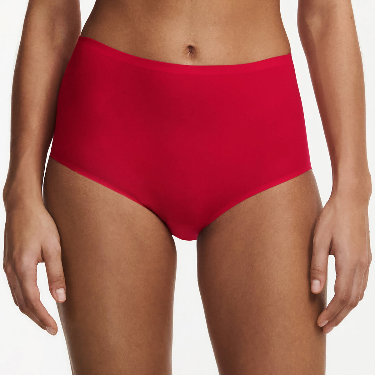 Red high-waisted bikini bottom on a plain background
