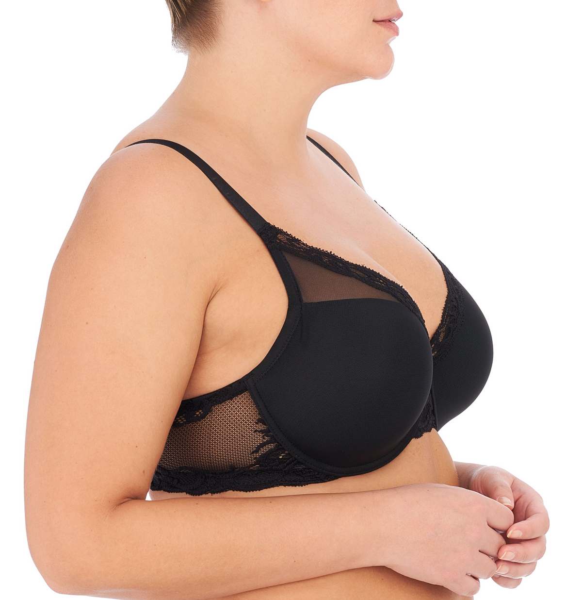 Black bra worn by a person on a white background