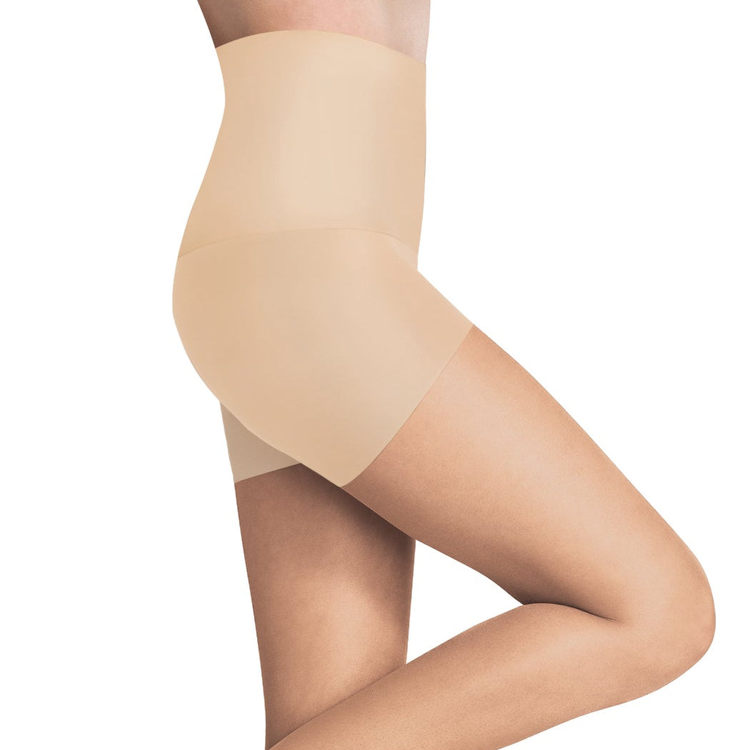 A side view of a person wearing sheer black control top tights and high heels, showcasing the smooth leg finish and high waistband.