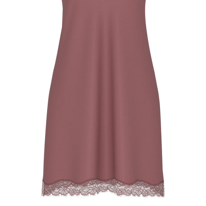 A dusty rose pink slip dress with thin straps and delicate lace trim along the V-neckline and hem, shown against a plain white background.