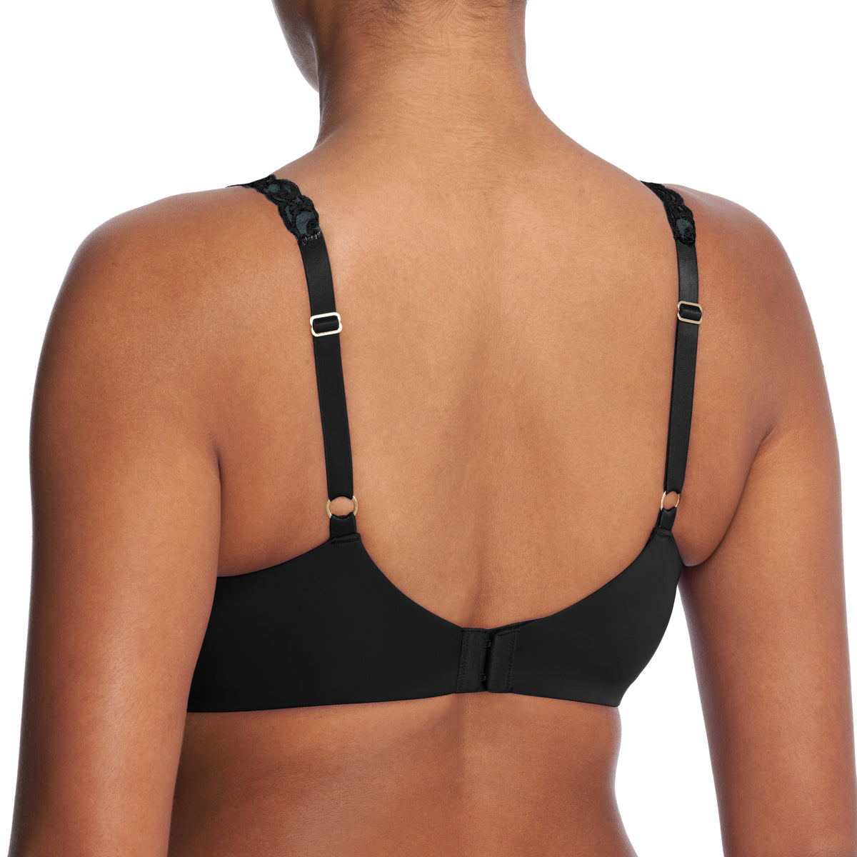 Black bra worn by a model on a white background