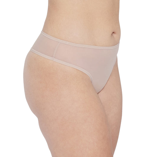 Beige underwear worn by a person on a white background