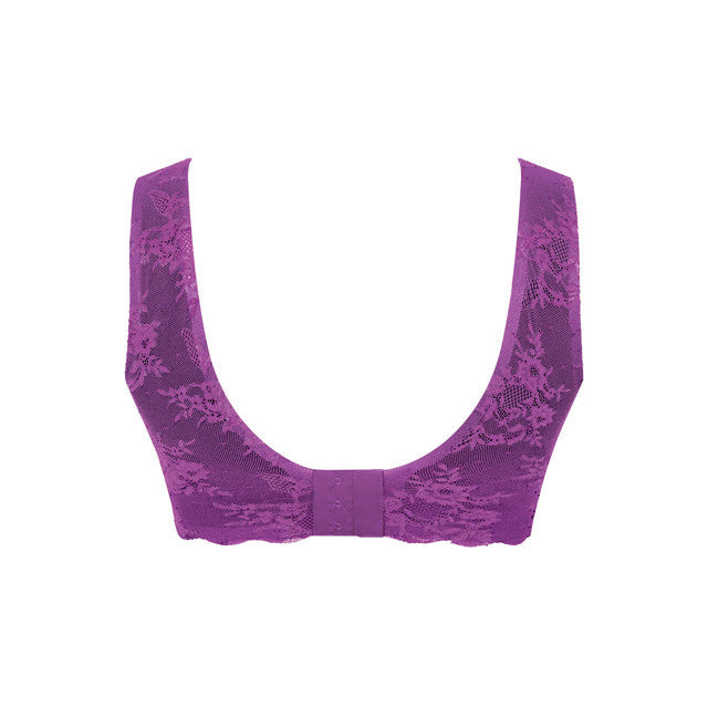 A purple textured fabric bralette with wide straps and a scoop neckline, shown against a plain white background.