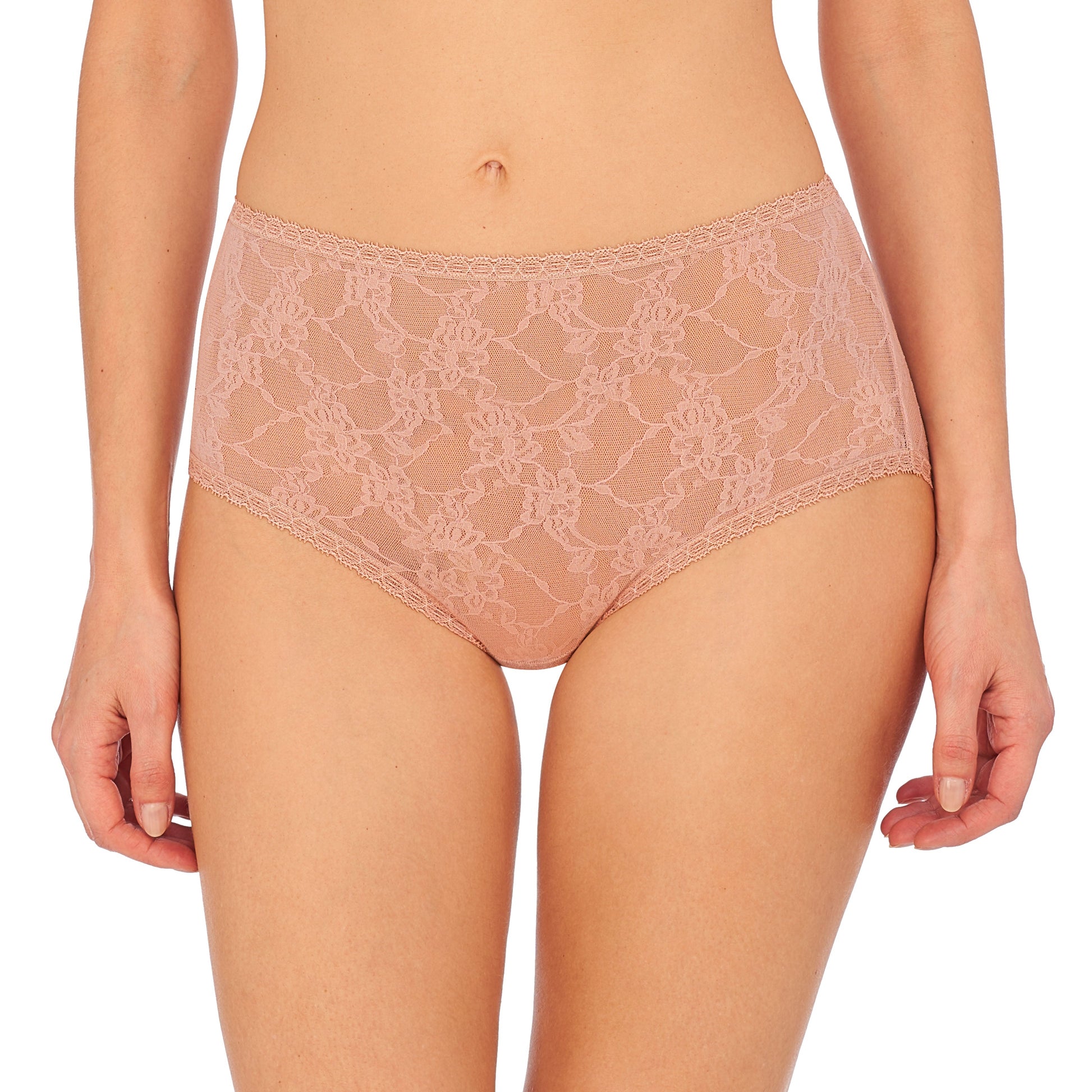 Lace underwear worn by a person on a white background