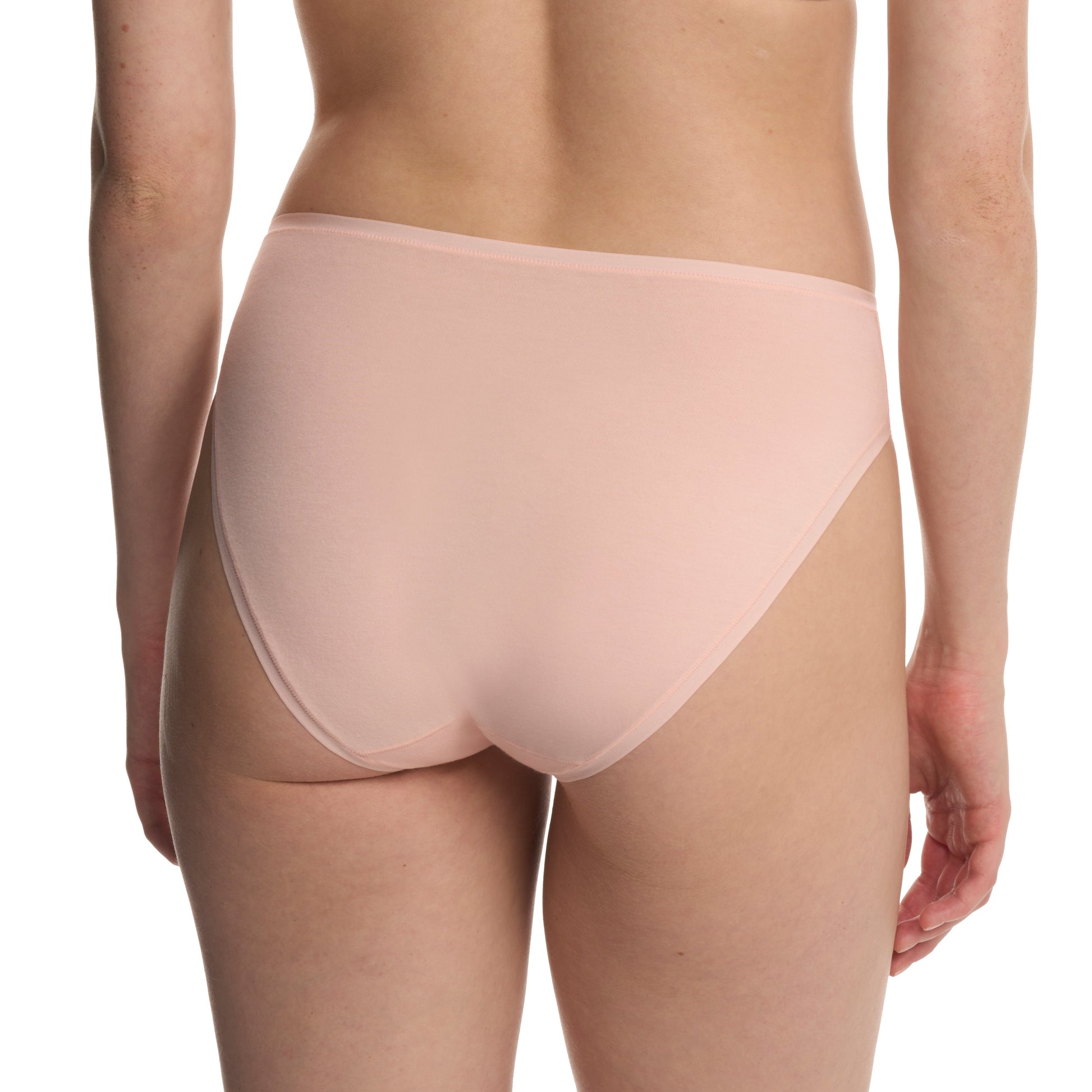 Light pink underwear worn by a person on a white background