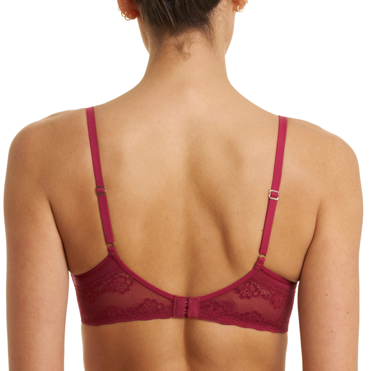 Red bra worn by a model on a white background