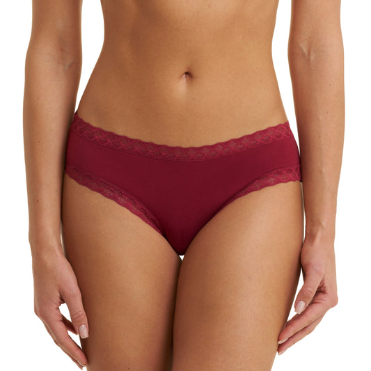 Maroon lace underwear worn by a model on a white background