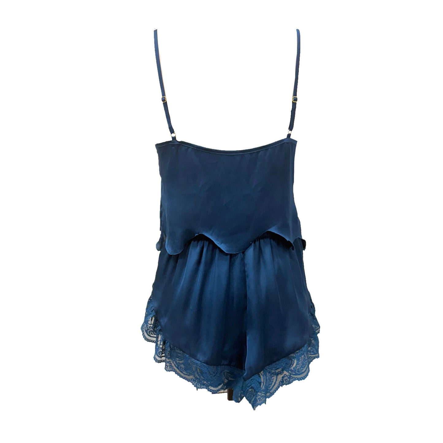 Blue lace tank and short set on a white background