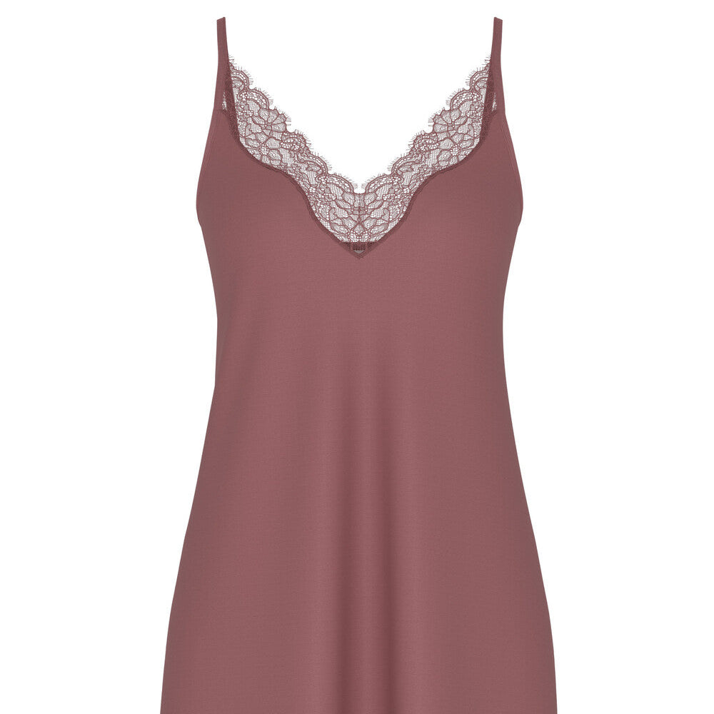 A dusty rose pink slip dress with thin straps and delicate lace trim along the V-neckline and hem, shown against a plain white background.