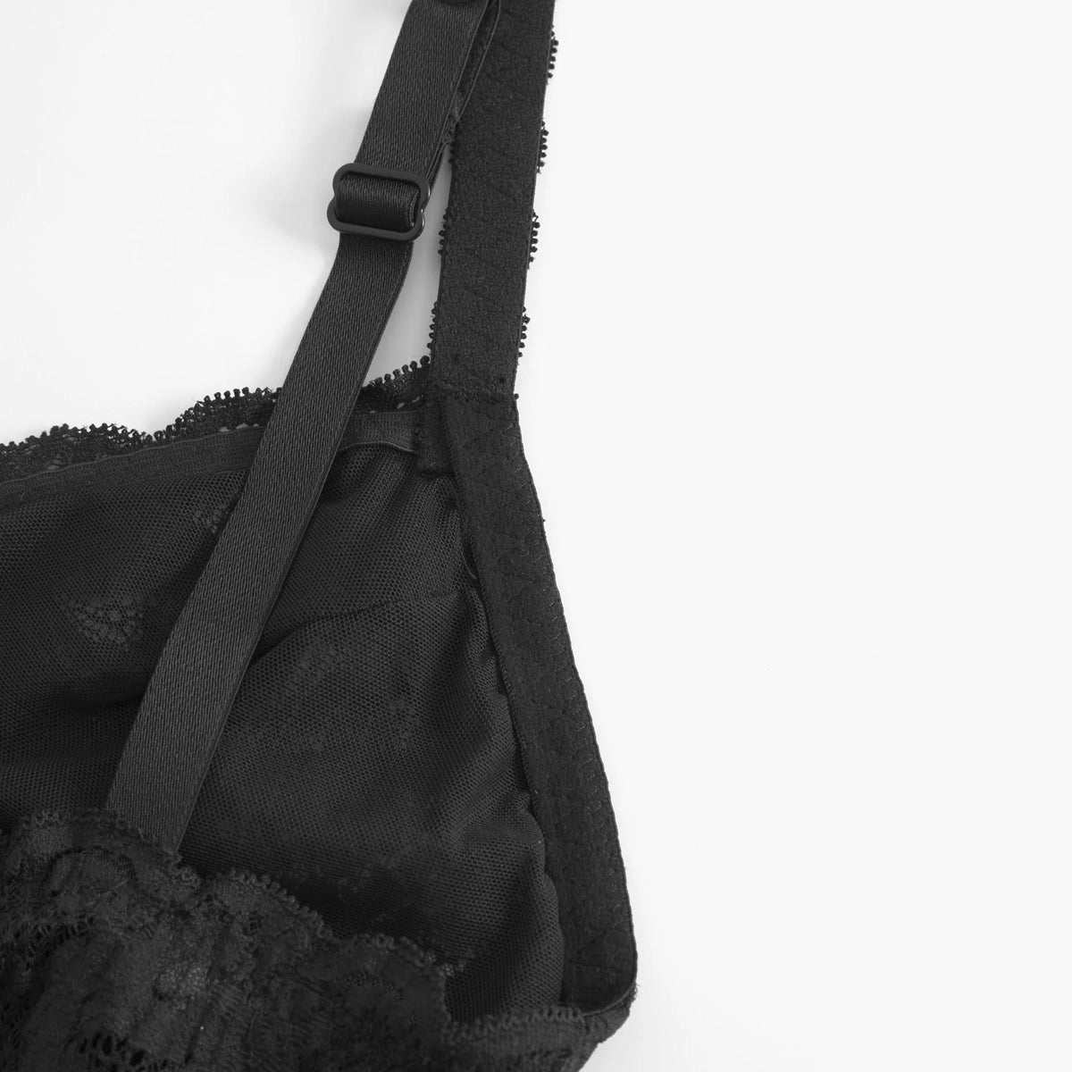 Black lace bra on a white background